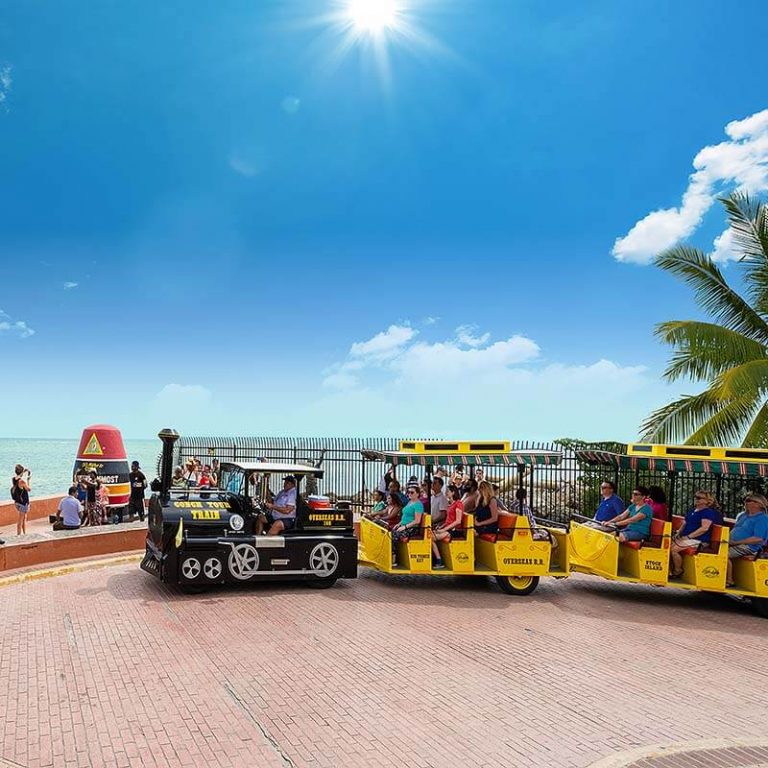 conch tour train driving past southernmost point